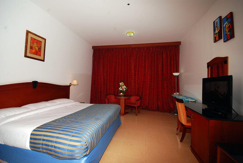 Ramee Garden Hotel Apartments Абу Даби Стая снимка